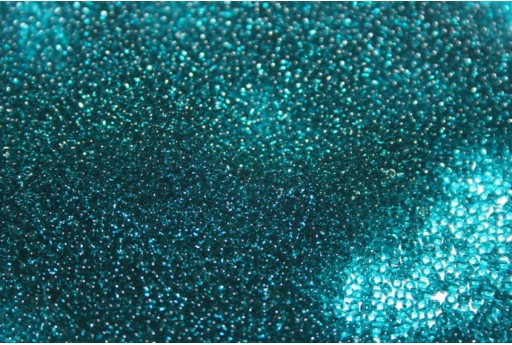 Perline Toho Transparent Capri Blue 15/0 - 10gr