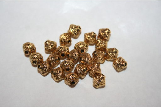 Bicono Argento Tibetano Colore Oro 7x6,5mm - 12pz