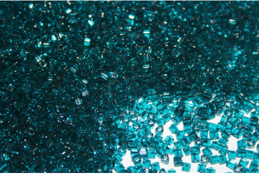 Perline Toho Triangoli 11/0, 10gr., Transparent Capri Blue TT11-7BD