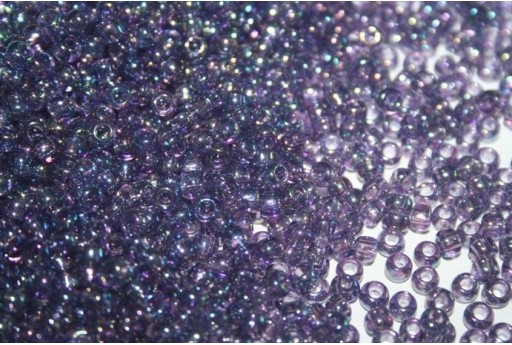 Perline Toho Round Rocailles 6/0, 10gr., Trans-Rainbow Sugar Plum Col.166D