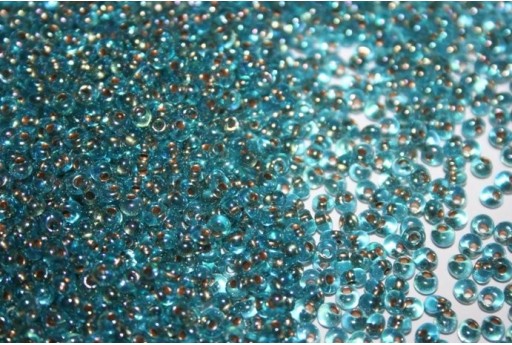 Perline Toho Magatama 3mm, 10gr., Gold-Lined Rainbow Aqua Col.995