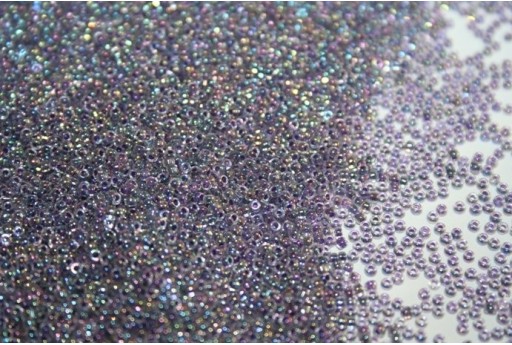 Perline Toho Round Rocailles 15/0, 10gr. Rainbow Crystal/Grape Lined