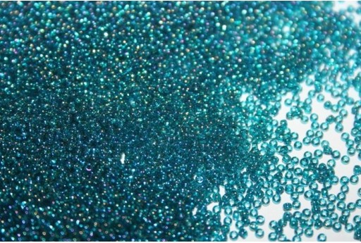 Perline Toho Round Rocailles 15/0, 10gr. Transparent-Rainbow Teal Col.167BD